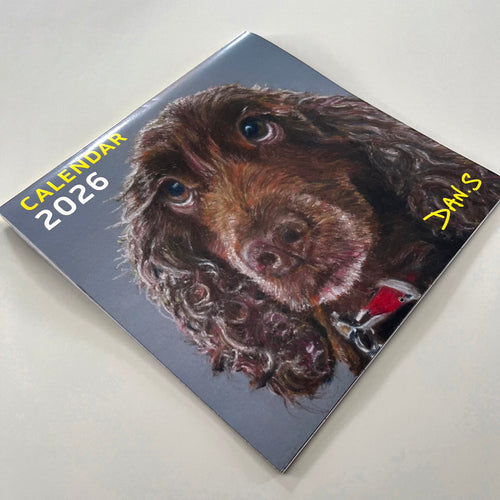 Calendar with a dog illustration on a grey background