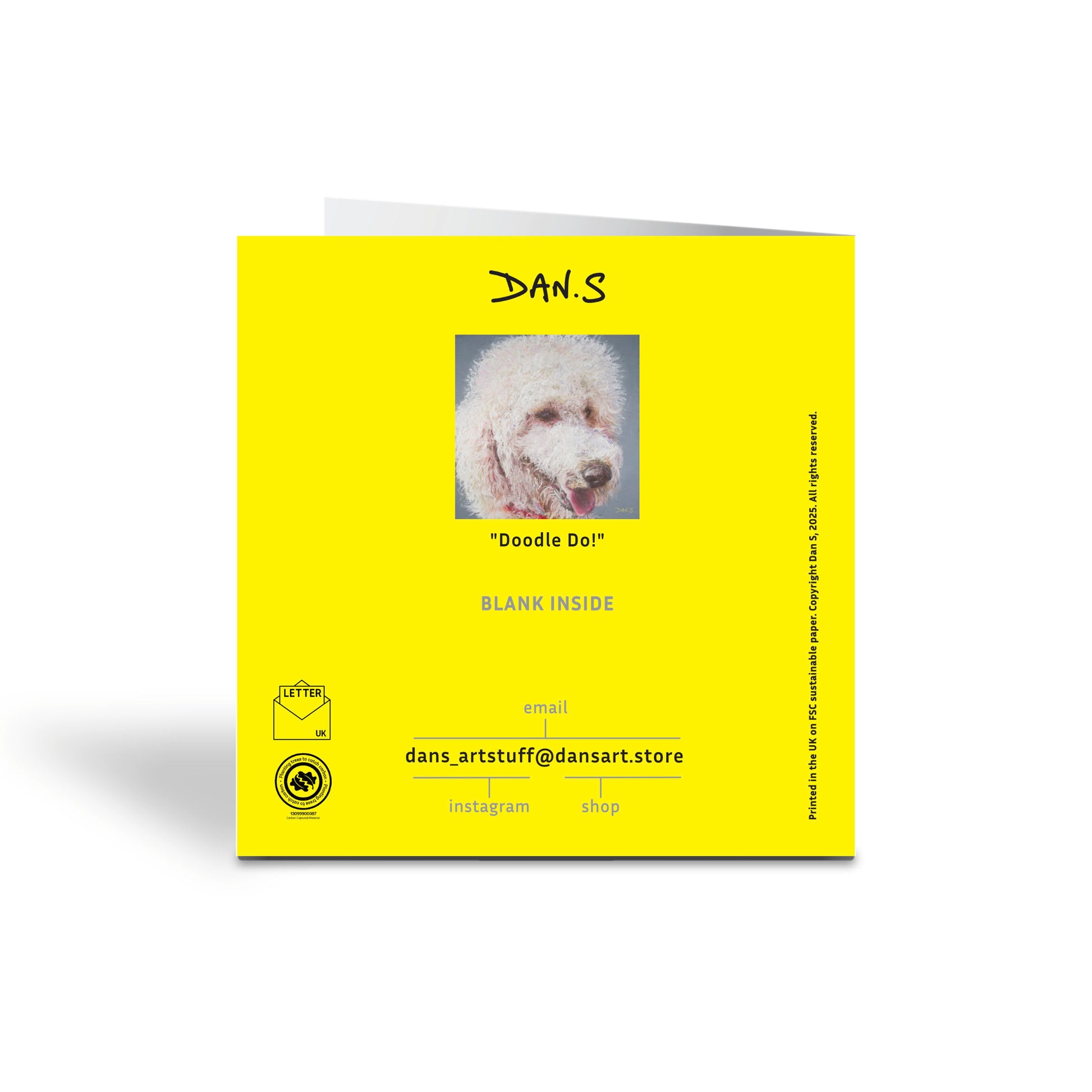 Back of a greetings card featuring a Golden Doodle 