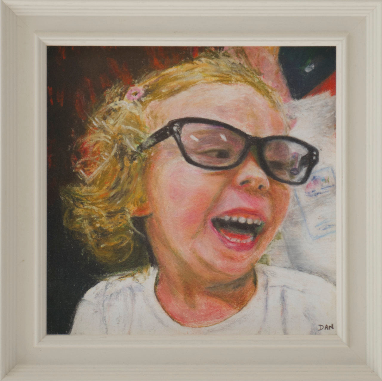 Framed artwork of a child with glasses and a surprised expression