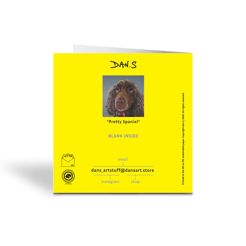 Picture of a card with a brown cocker spaniel's face with a grey background - back of the card
