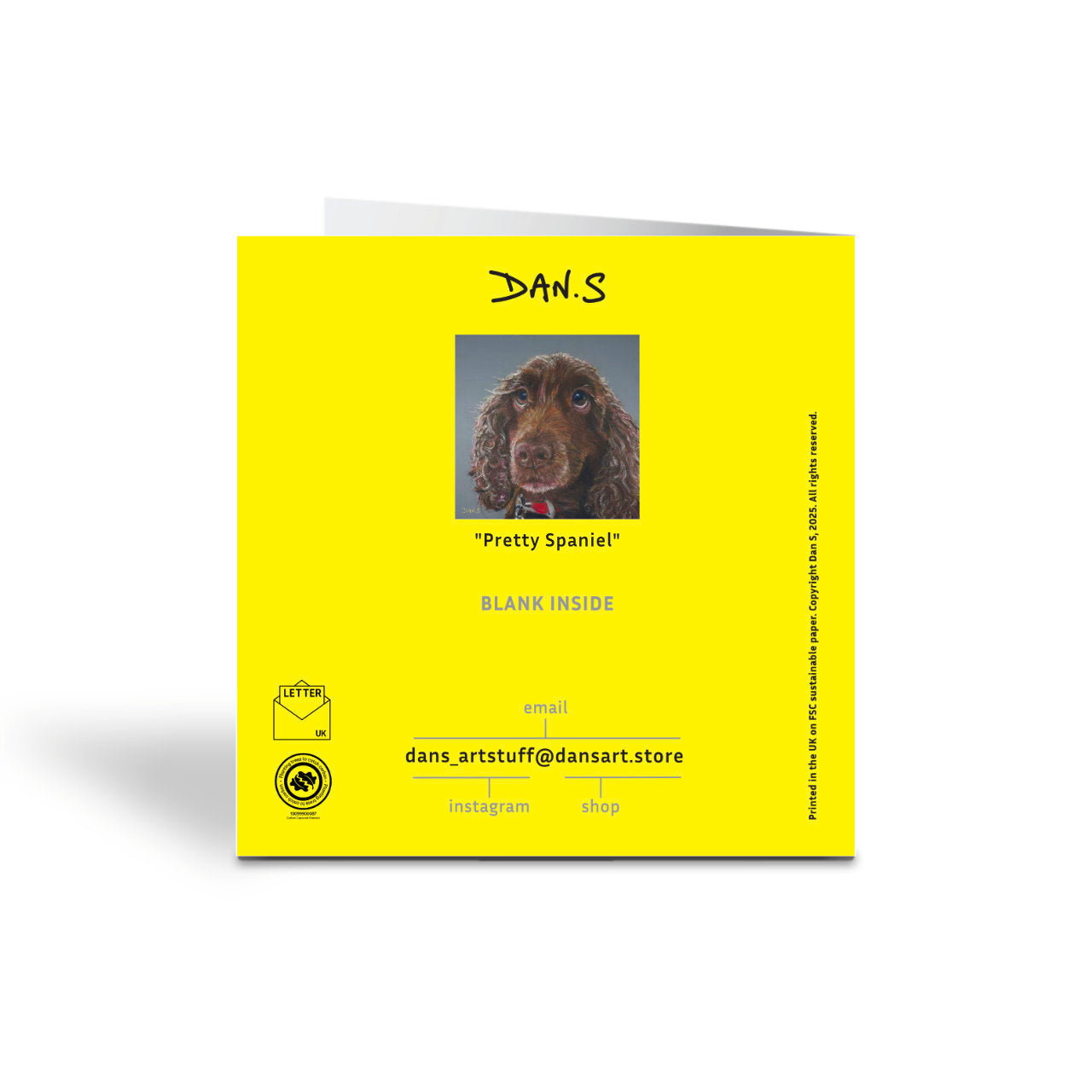 Picture of a card with a brown cocker spaniel's face with a grey background - back of the card