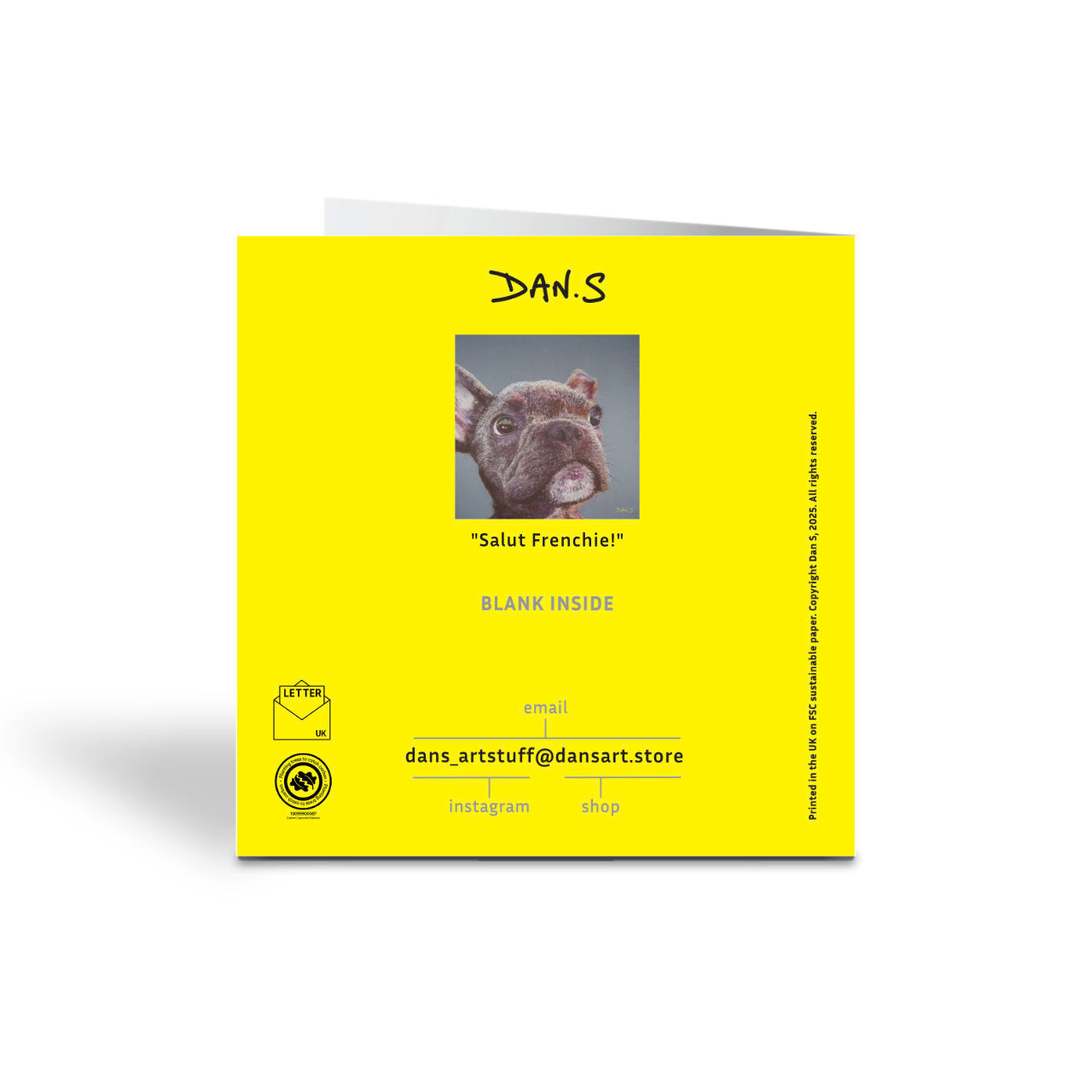 Back of a yellow greetings card featuring a French Bulldog's face 