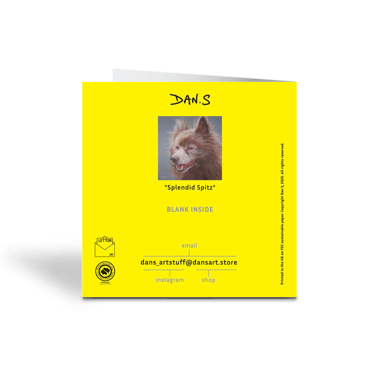 Picture the back of a greetings card with German Spitz on a grey background