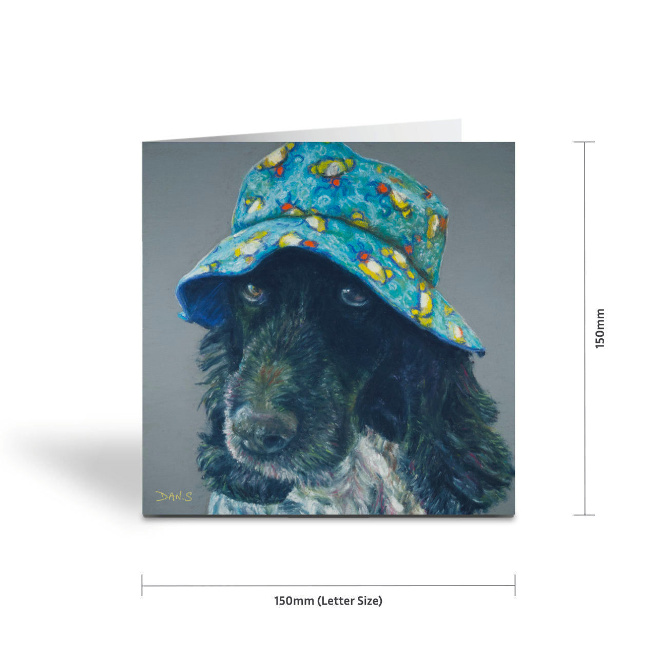 Card featuring a cocker spaniel wearing a colourful bucket hat on a grey background 